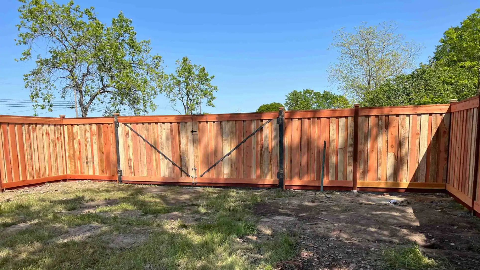 fence with a metal frame door