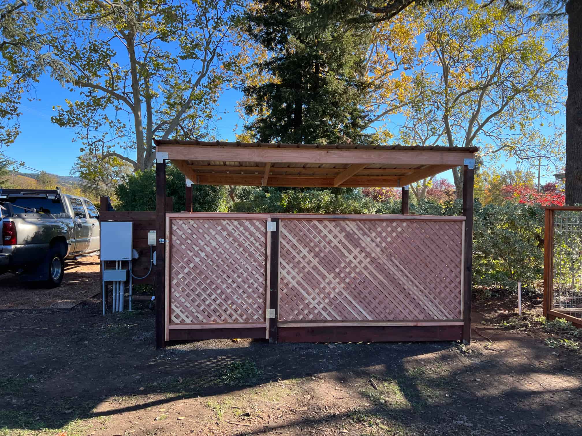 forward facing view of trash enclosure made of wood